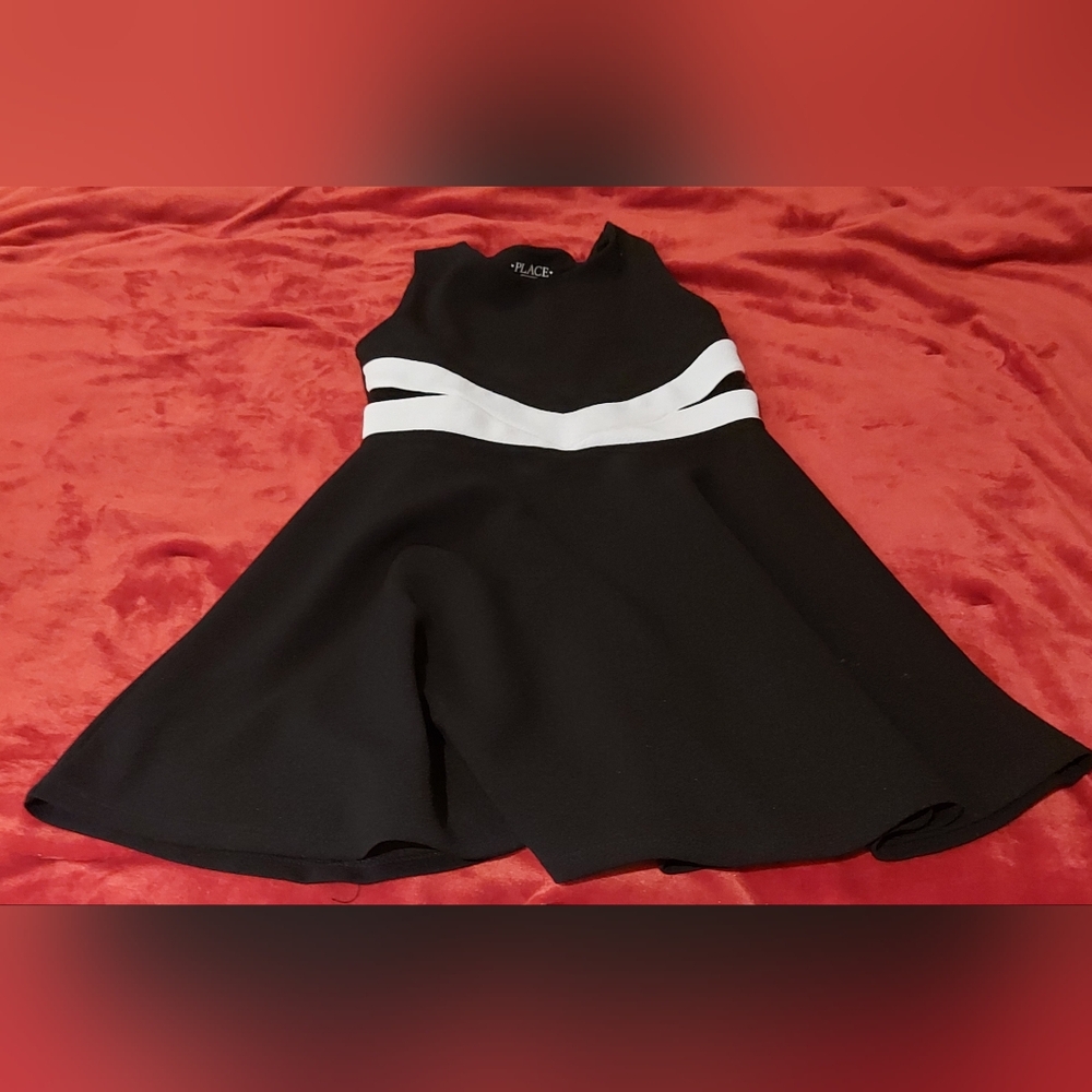 **3 Listings $30**                       Black and White Kids Dress